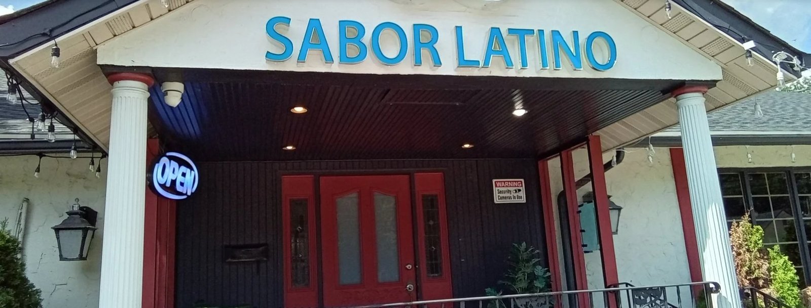 Sabor Latino entrance with OPEN sign, Netcong NJ